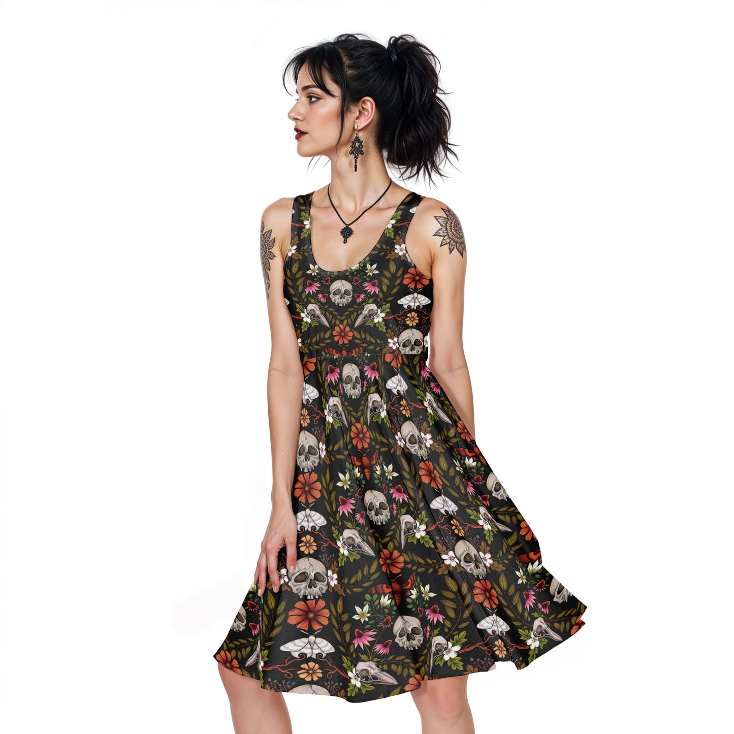 Dark cottagecore enchanted forest skater dress with witchy vibes on a gothic woman with tattoos