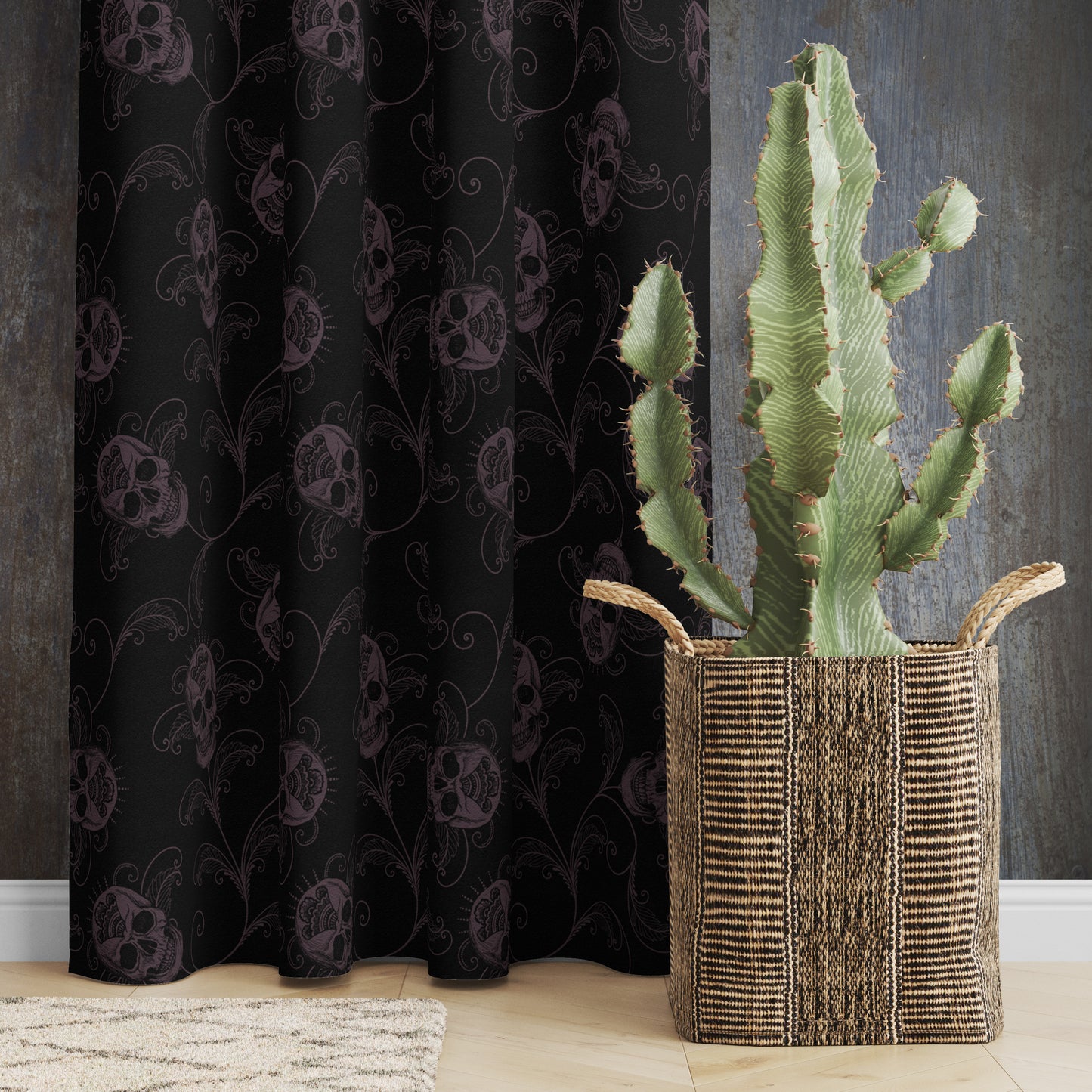 Black curtain with skull pattern next to a wicker basket with a cactus, Red Finch Creations