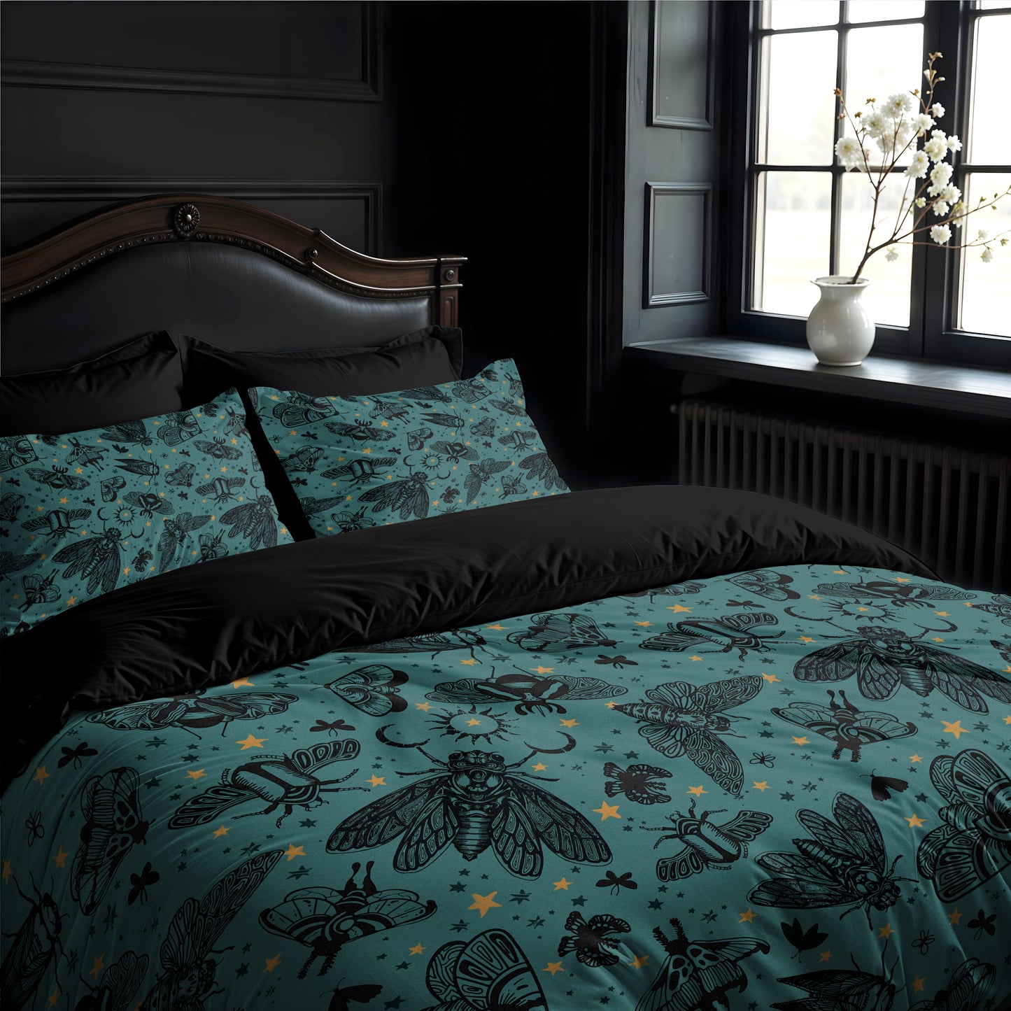 Bed with teal bedding featuring black witchy cicada and moth pattern, in a darkly decorated gothic room with a window and vase.
