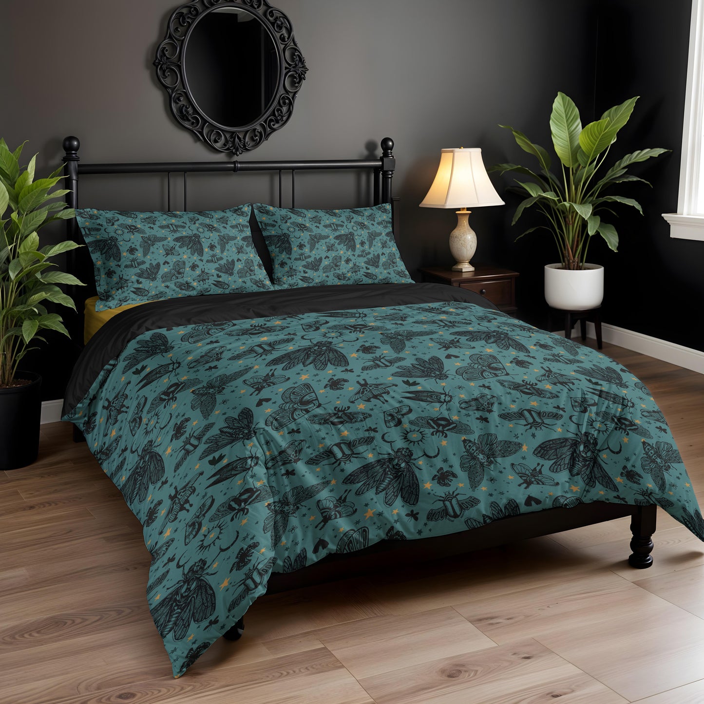 Teal witchy cicada moth patterned bedding set on a bed in a dark cottagecore bedroom with plants and a lamp.