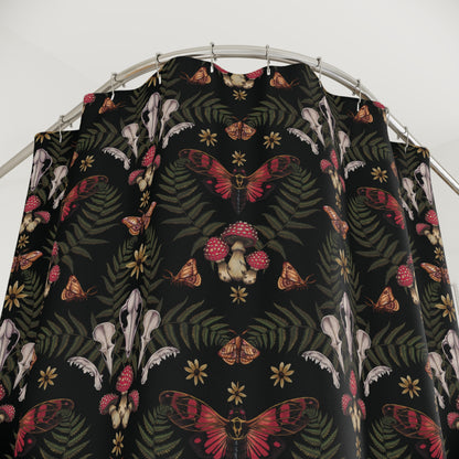 Dark fabric with nature-themed pattern featuring butterflies, mushrooms, and skulls on a white background.