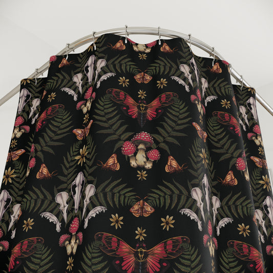 Dark fabric with nature-themed pattern featuring butterflies, mushrooms, and skulls on a white background.