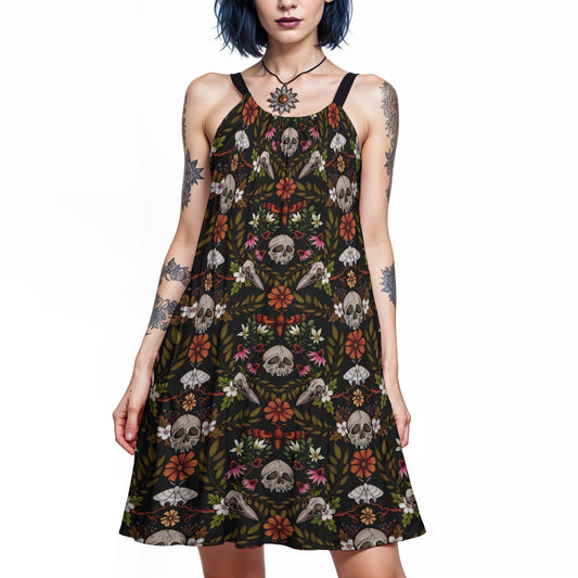 Dark cottagecore enchanted forest cotton dress with witchy vibes on a gothic woman with blue hair and tattoos