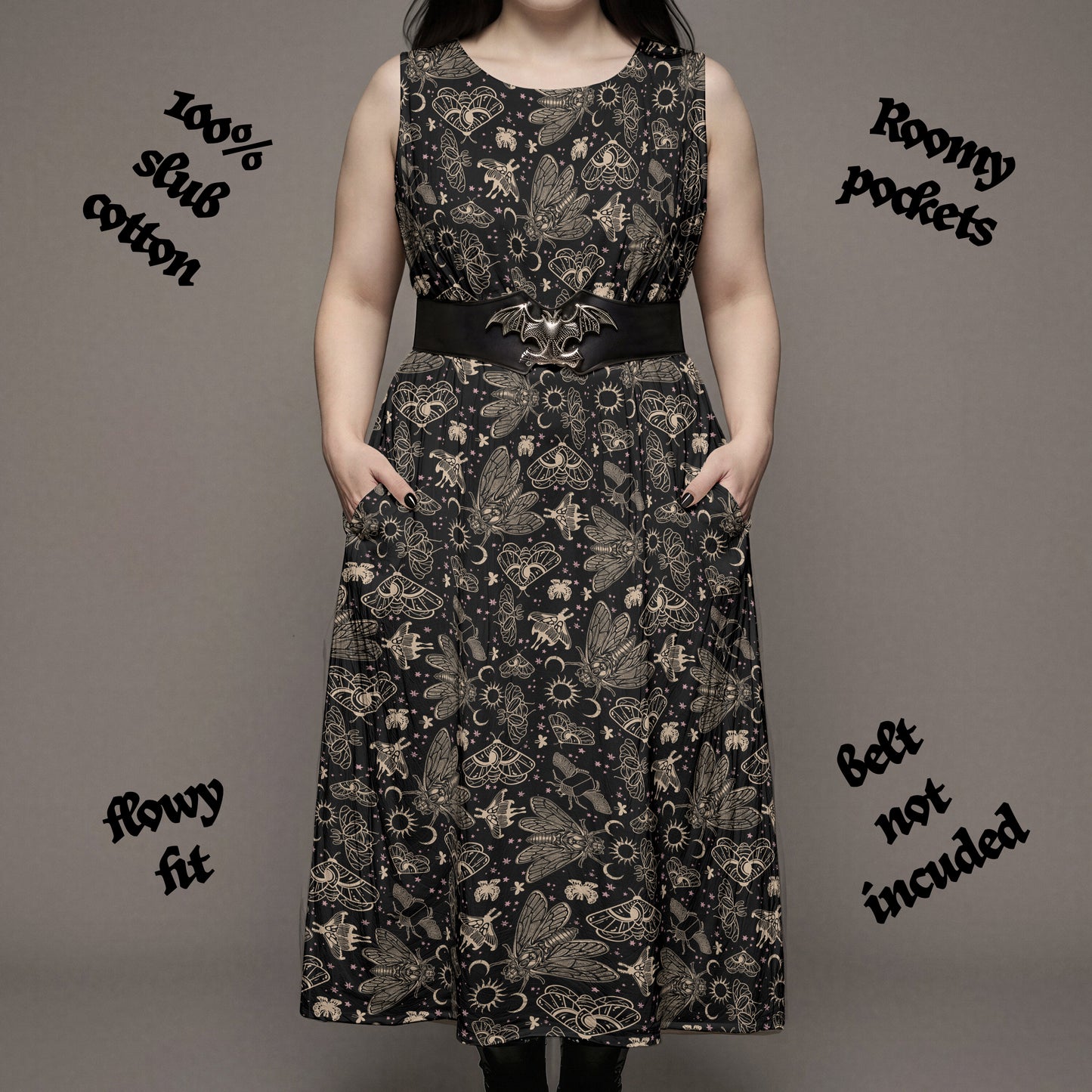 goth woman in a Long black dress with witchy cicada and moth print on a plain background with text indicating fabric details.