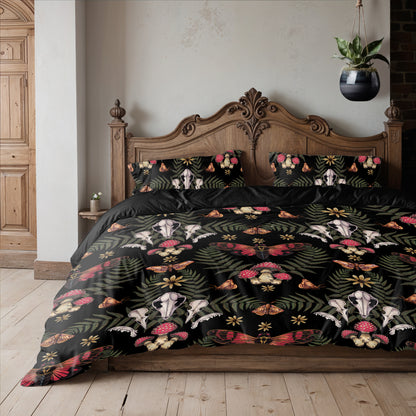Bed with skull and floral patterned bedding in a bedroom setting.