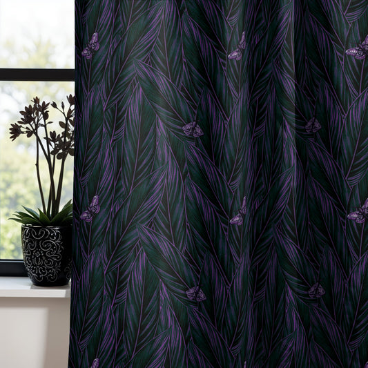 dark cottagecore veridian leaf and moth curtains with moody botanical vines in front of a gothic window with black flowers