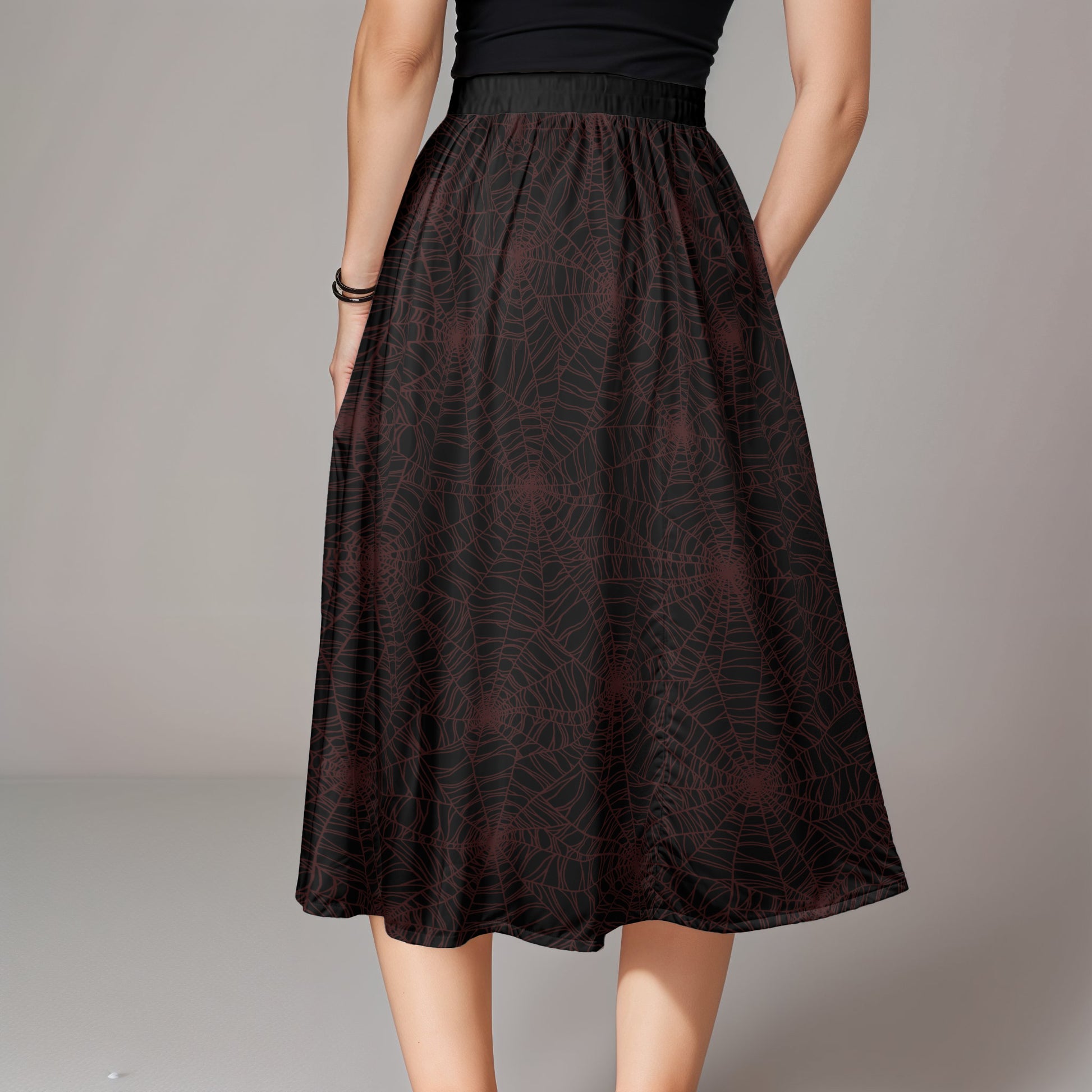 dark gothic spider web skirt with pockets in deep maroon red and black on a gothic woman from the back
