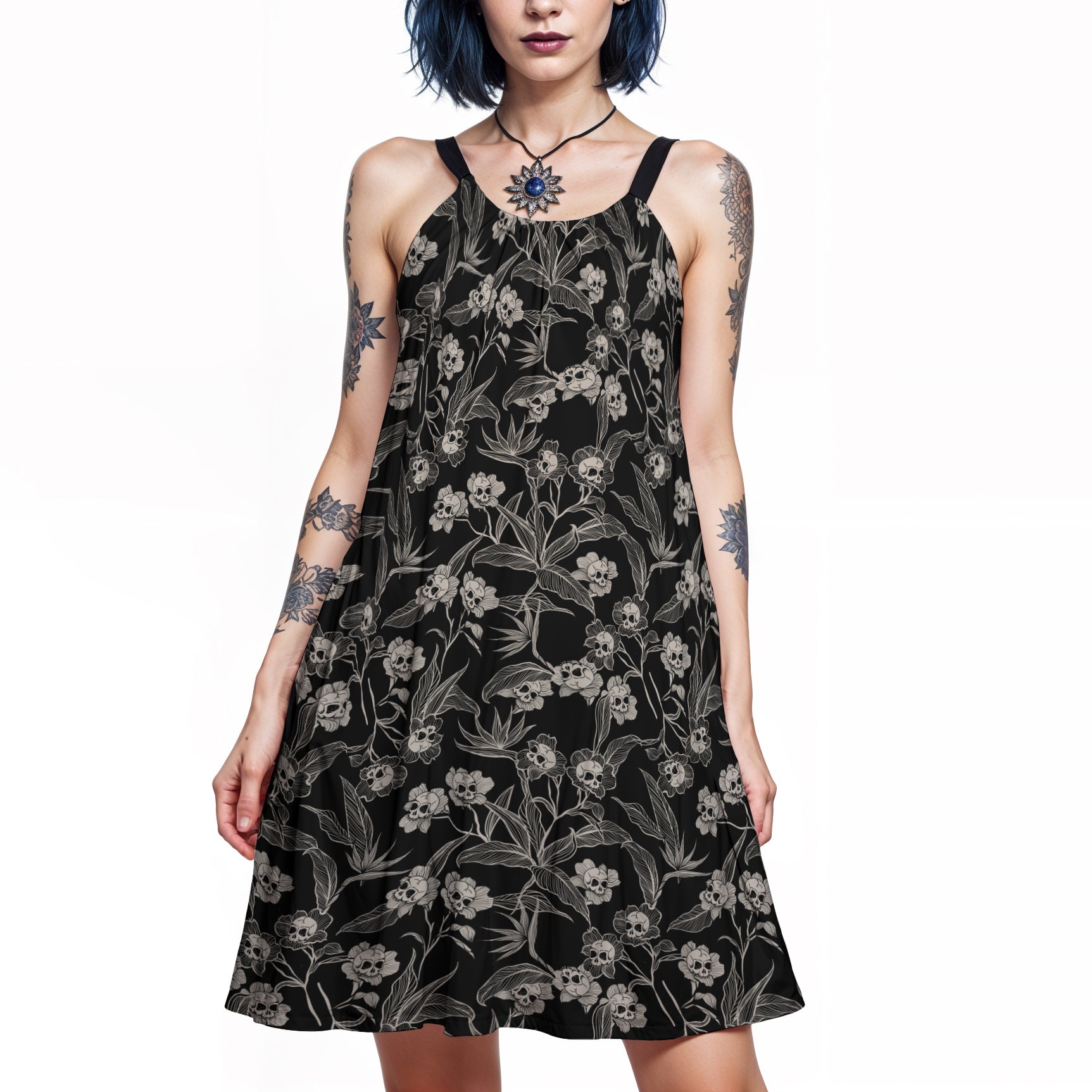 gothic_floral_skull_flower_dress_rayon_dress_with_spooky_vibes_on_a_goth_woman_with_blue_hair_and_tattoos