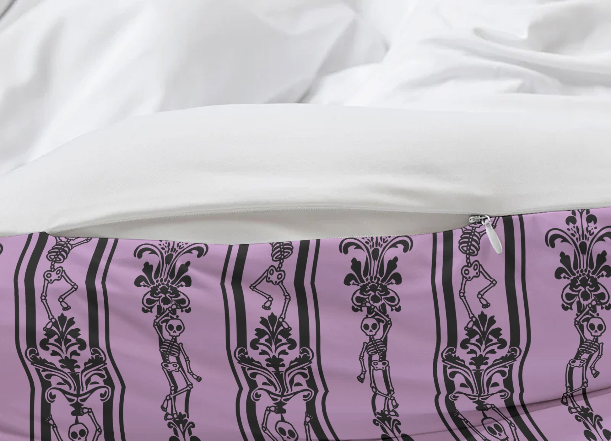 Purple fabric with black skeleton designs on a white background