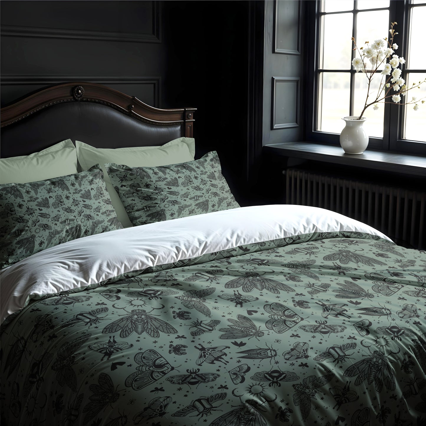 gothic Bed with witchy green and black patterned bedding in a room with dark walls and a window.