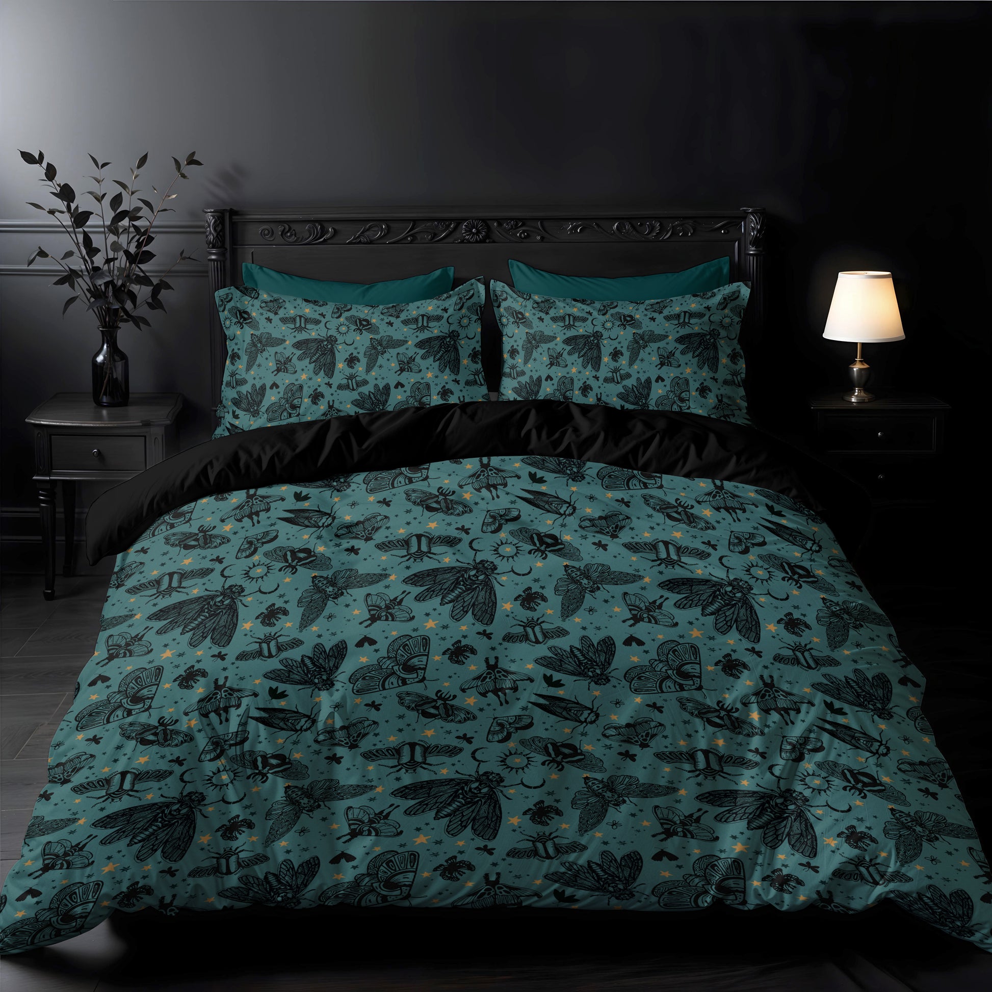 Teal and black witchy cicada moth patterned bedding set on a baroque bed in a dimly lit gothic room.
