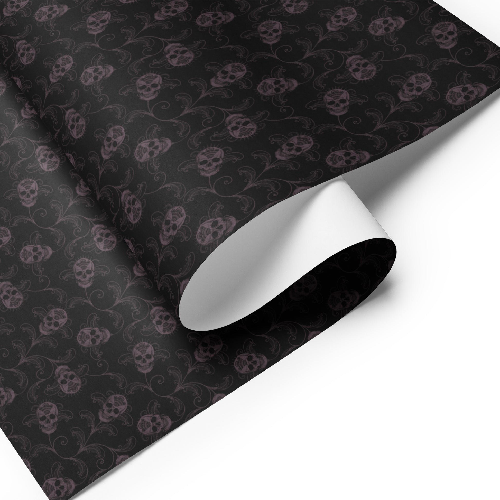 Black wrapping paper with skull and vine pattern