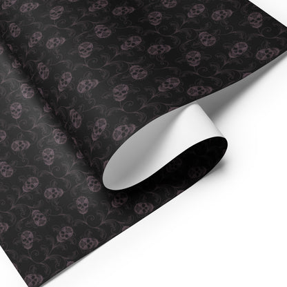 Black wrapping paper with skull and vine pattern