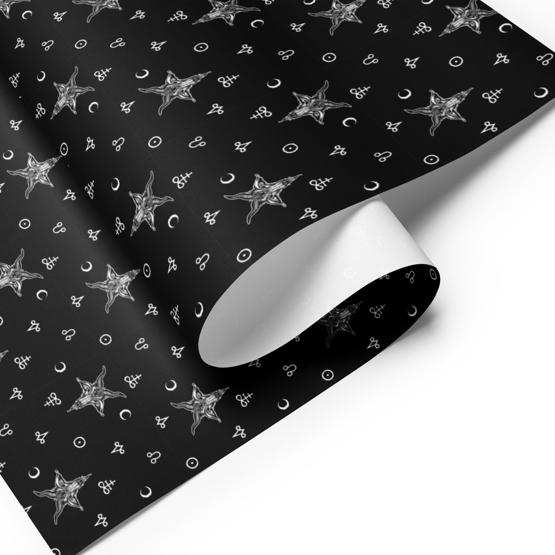 Black wrapping paper with white star and moon pattern